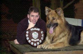 Highly trained protection dogs, UK. Alaster Bly with one of his dogs